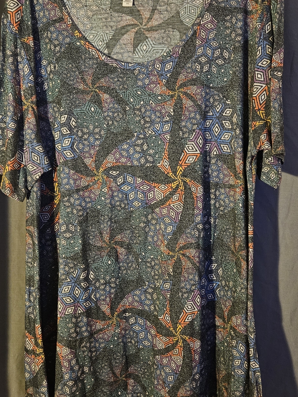 LuLaRoe Perfect T. With Geometric Pinwheel in Navy, Teal, Purple, Orange